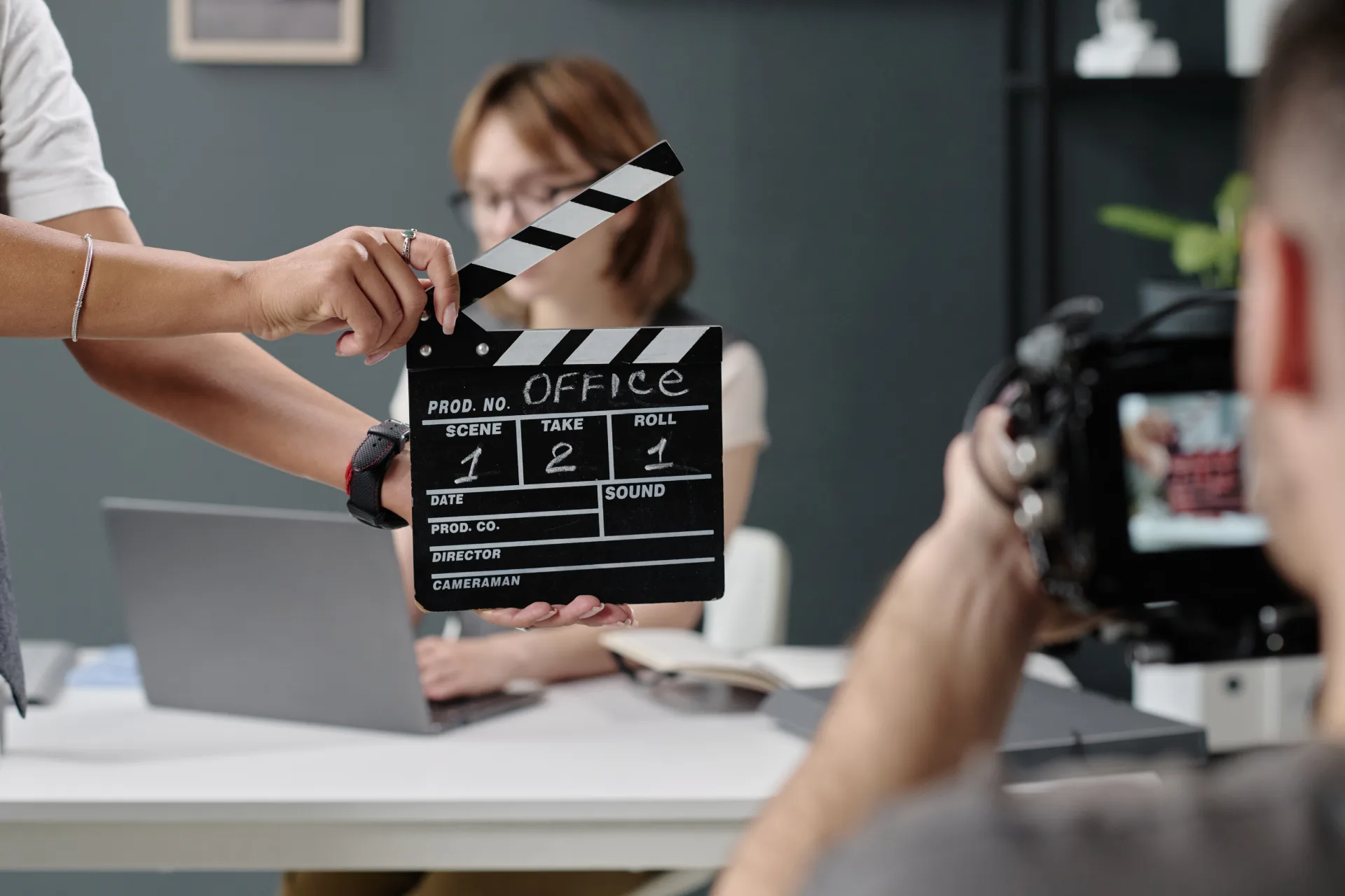 clapperboard in female hands