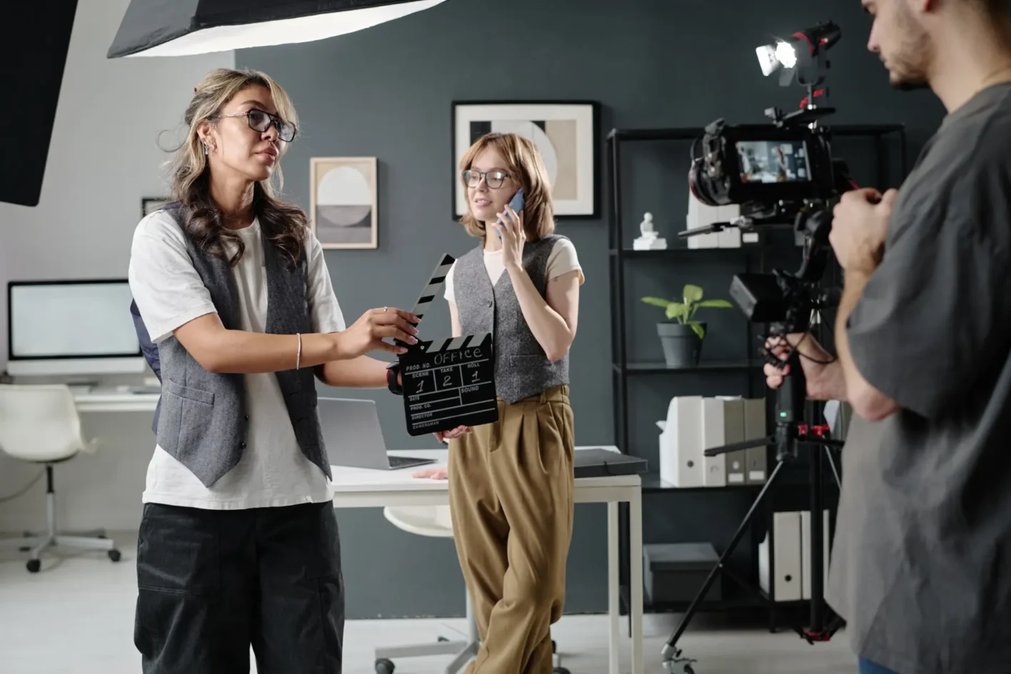 woman using clapperboard