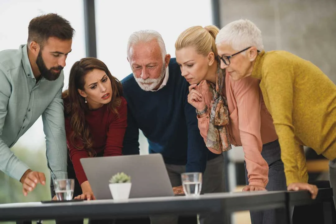 Happy team discussing ideas during a meeting